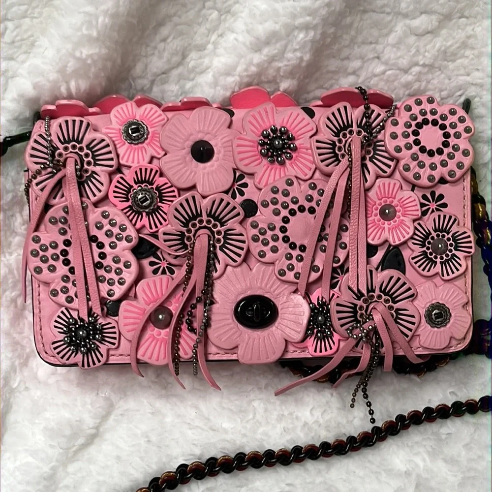 Available Coach dinky with pink wild  tea rose limited edition